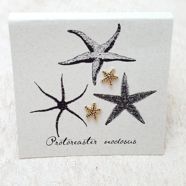 front of gold starfish card