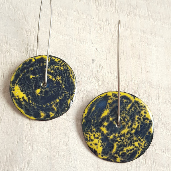 Yellow and blue enameled copper earrings.