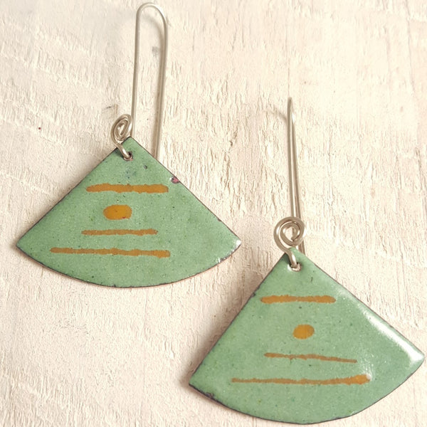 Green enameled copper earring with brown stripes.