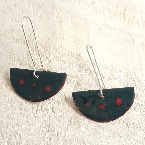Dark green enameled copper earrings with red dots.