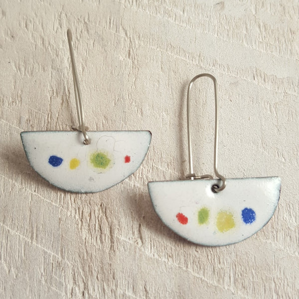White enameled copper earring with colorful dots.