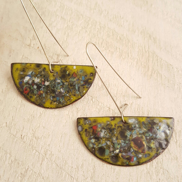 Lime green enameled copper earrings with speckled accents.