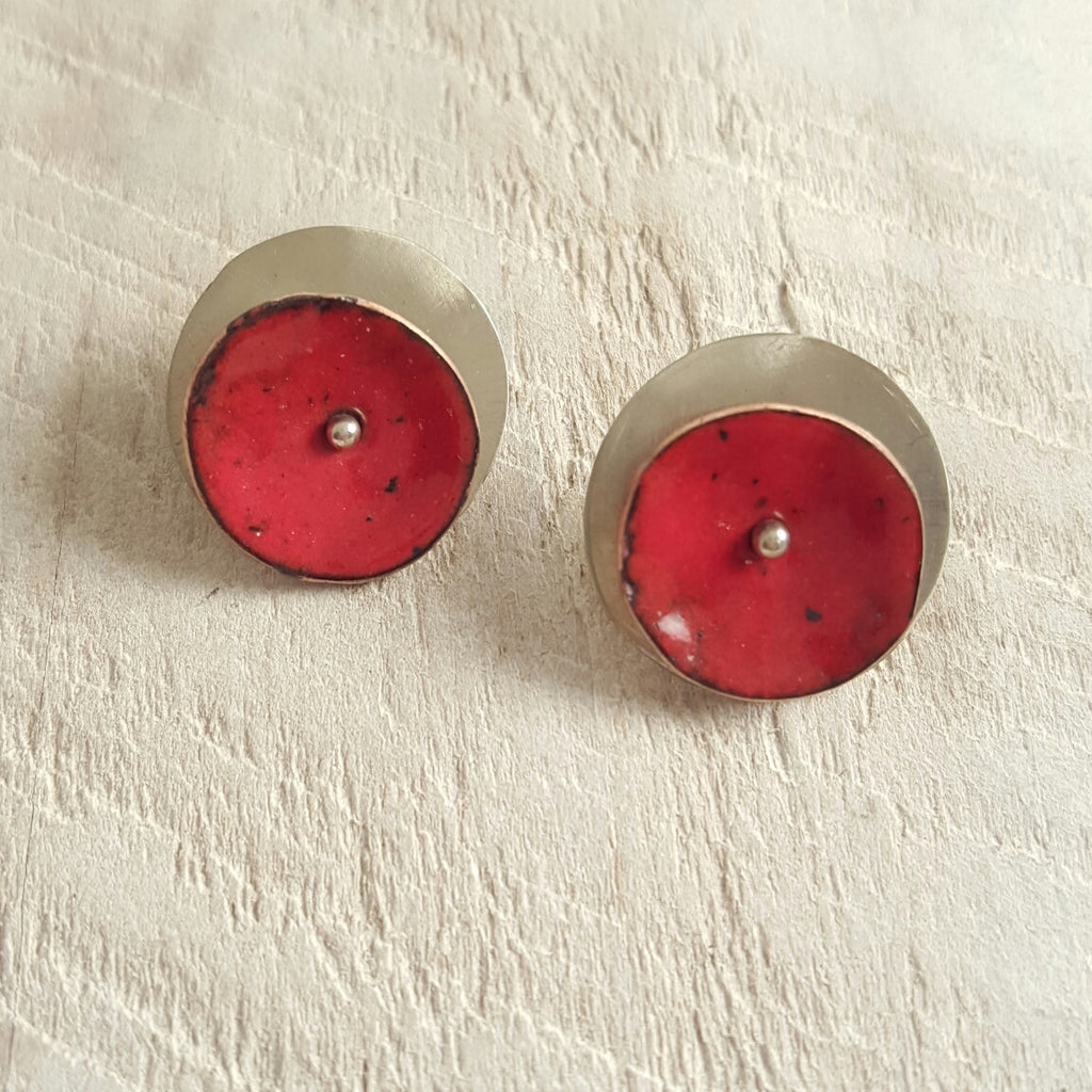 Red enameled copper studs.