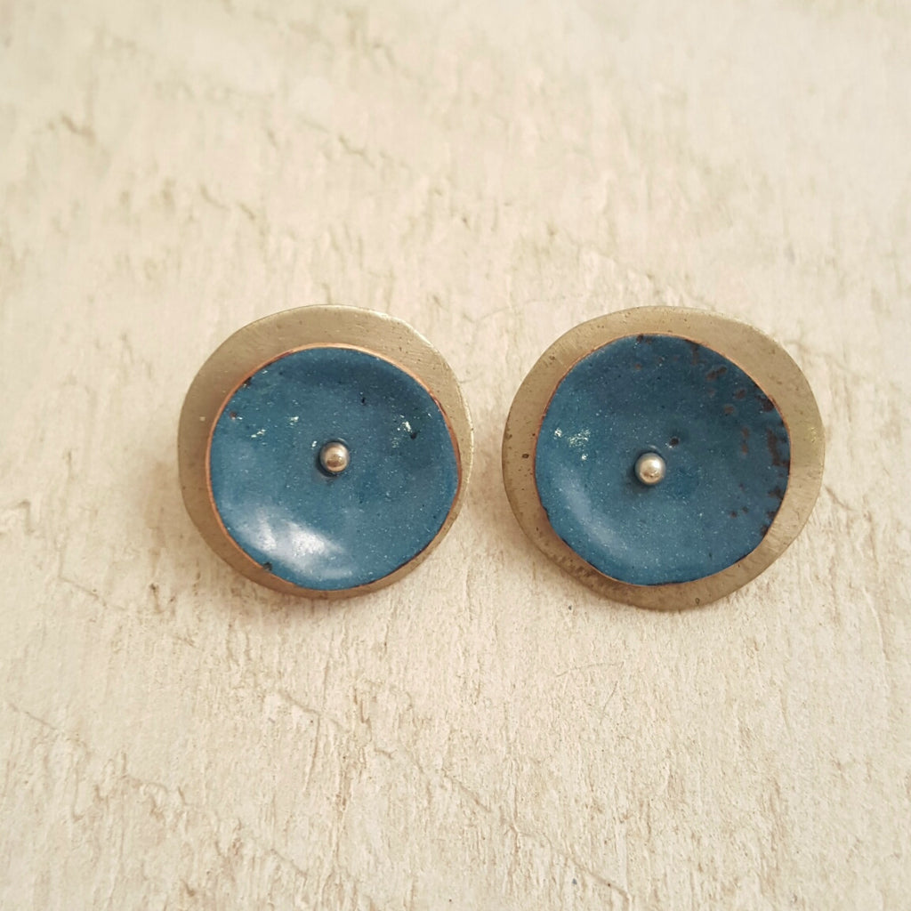 Turquoise enameled copper studs.