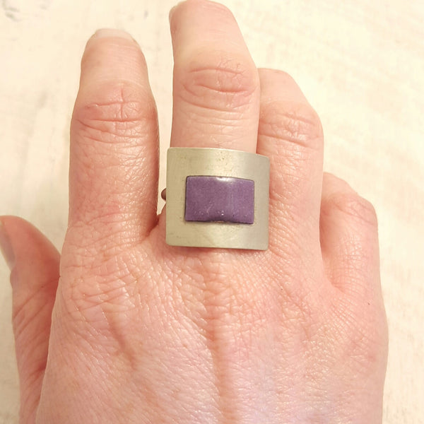 Purple enameled copper ring.