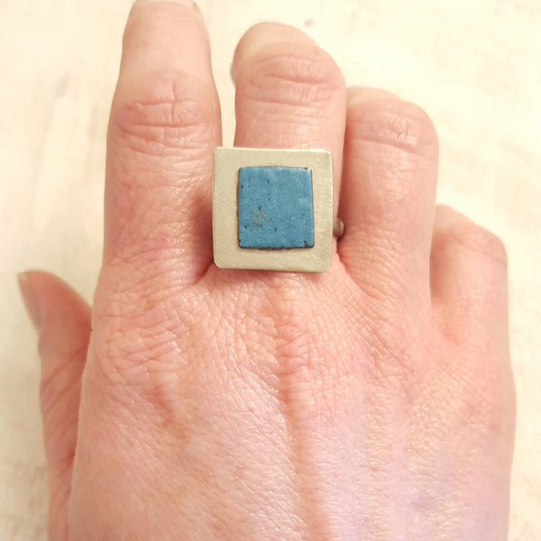 Turquoise blue enameled copper ring.