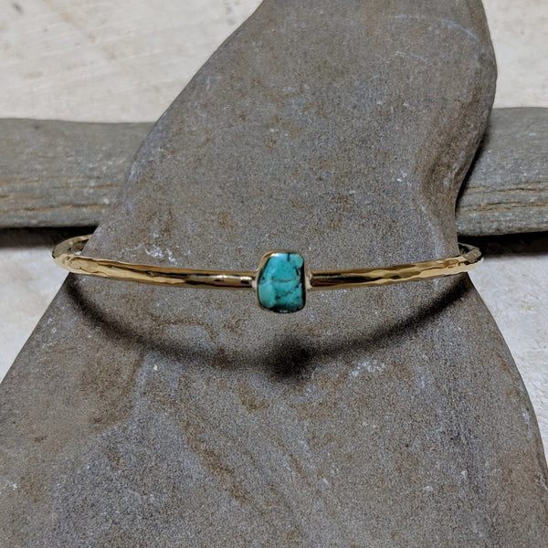 angled view of aviva bracelet with turquoise