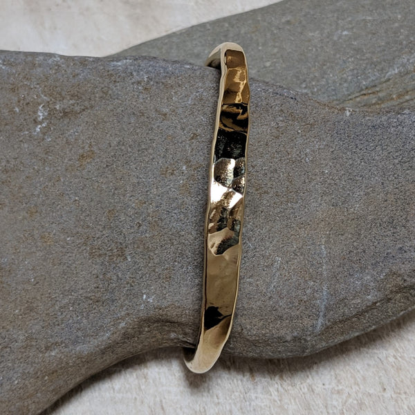 front view of gold hammered cuff