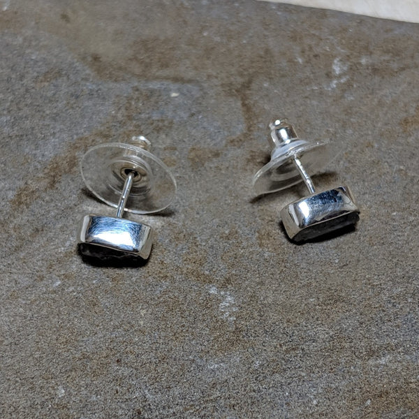 side view of silver and quartz rocha studs