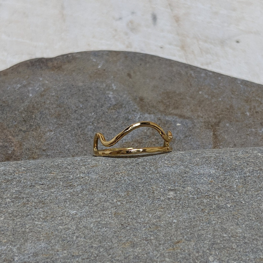 front view of cloud ring in gold colored tumbaga