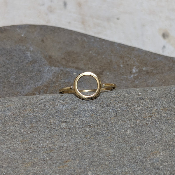 front view of gold open circle ring