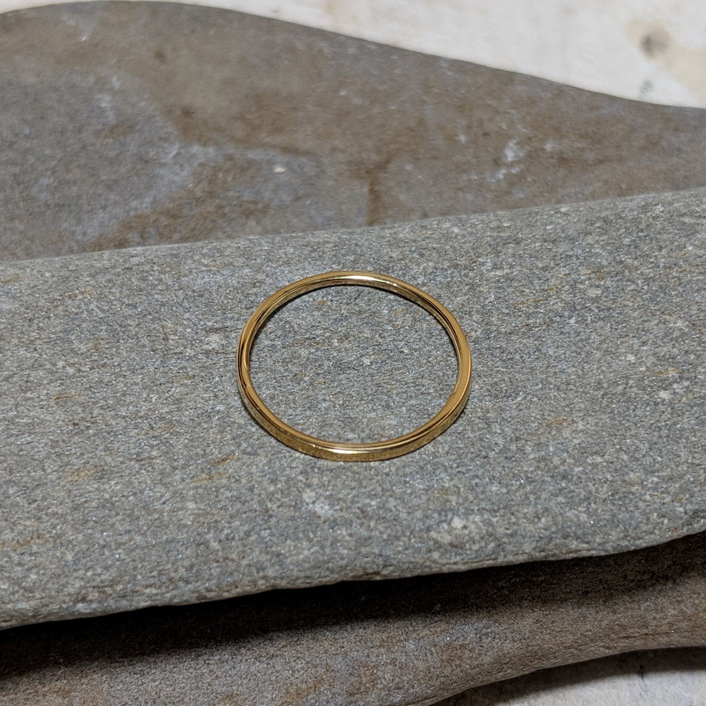 side view of quinn plain stacking ring in gold color