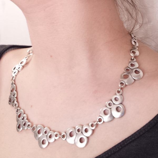 foam necklace on model